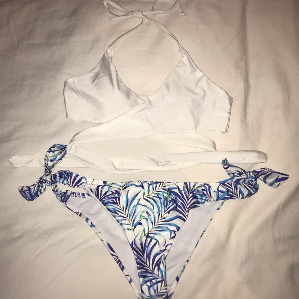 White wrap bikini top and floral bottoms